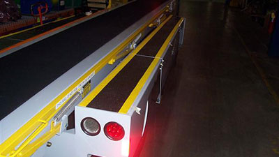 Jet bridge belt loader with Safeguard Anti-Slip Covers