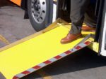 A bus features a non-slip access ramp Direct Gritted with Safeguard’s Hi-Traction® surface