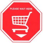 Sign that looks like a stop sign but says "Please Wait Here" with a Shopping Cart