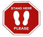 Stop Sign look-a-like that reads "Stand Here Please" with Foot Prints