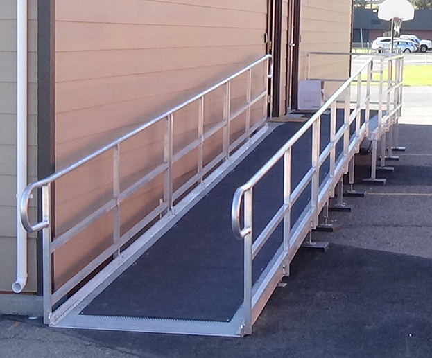 ADA ramp with anti-slip cover