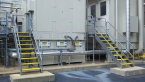 Yellow Safeguard Hi-Traction® anti-slip step covers protect workers in a power plant