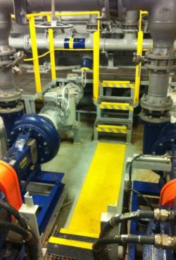 Bright yellow anti-slip Walkway cover in chemical facility