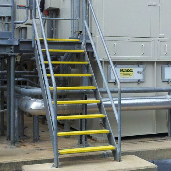 Yellow Anti-Slip Step covers on Silver colored Metal stairs